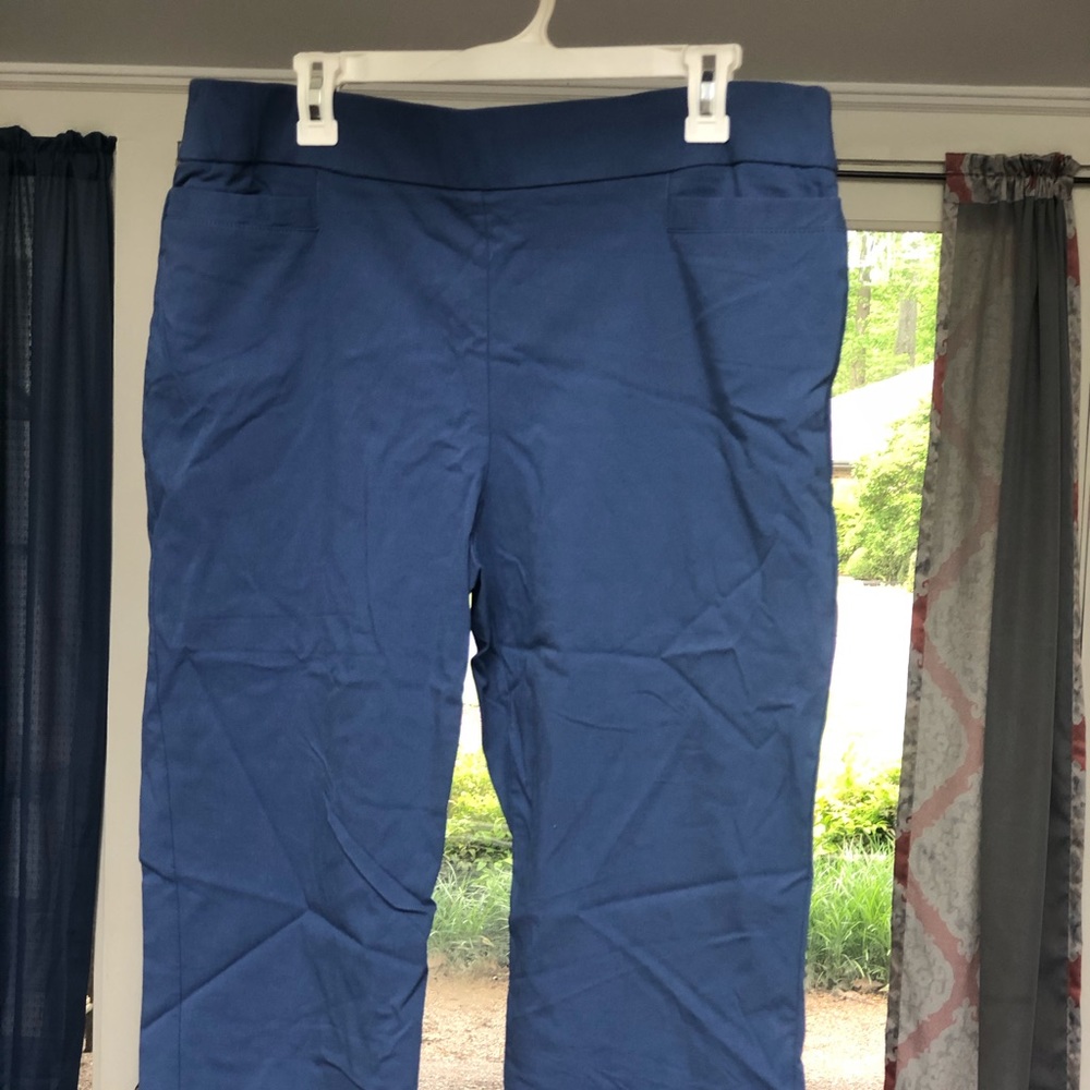 Light blue capris.